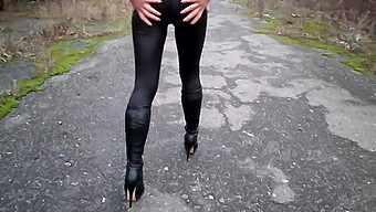 Tight Leggings And Heeled Boots In A Foot Fetish Scene