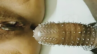 Watch This Indian Wife Use A Condom To Pleasure Her Husband'S Ass